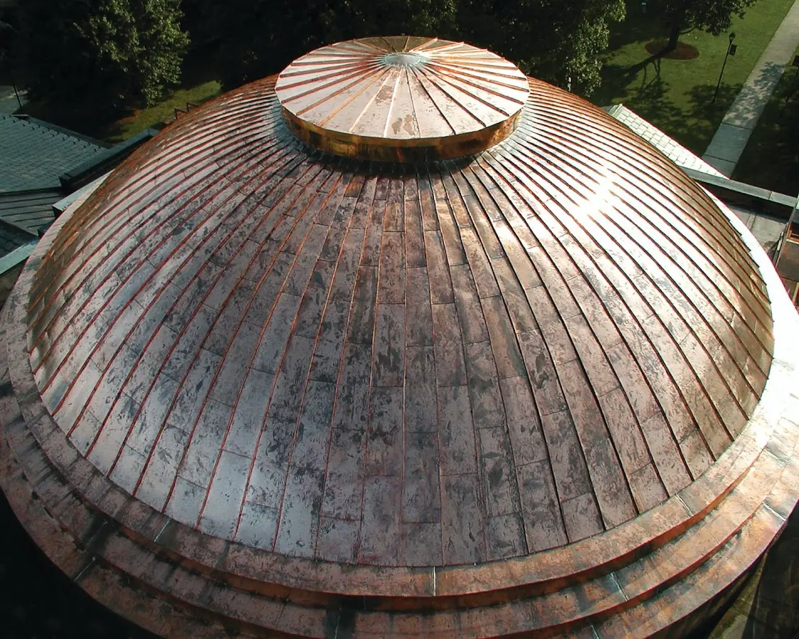 Craftsman Roofing crew installing a new roof in Merrill